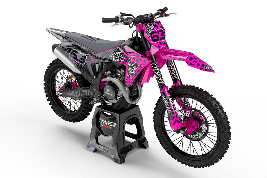 Front view of the Pink Panther graphics kit on a KTM motocross bike.