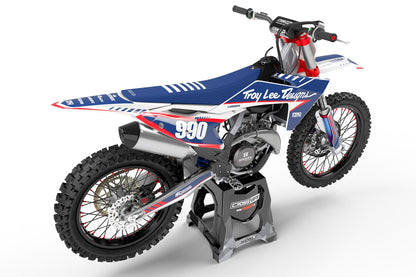 Rear view of the Pro White racing graphics kit on a KTM dirt bike.