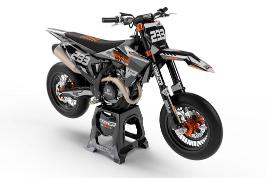 Front view of the Volt Grey motocross graphics kit on a KTM dirt bike.