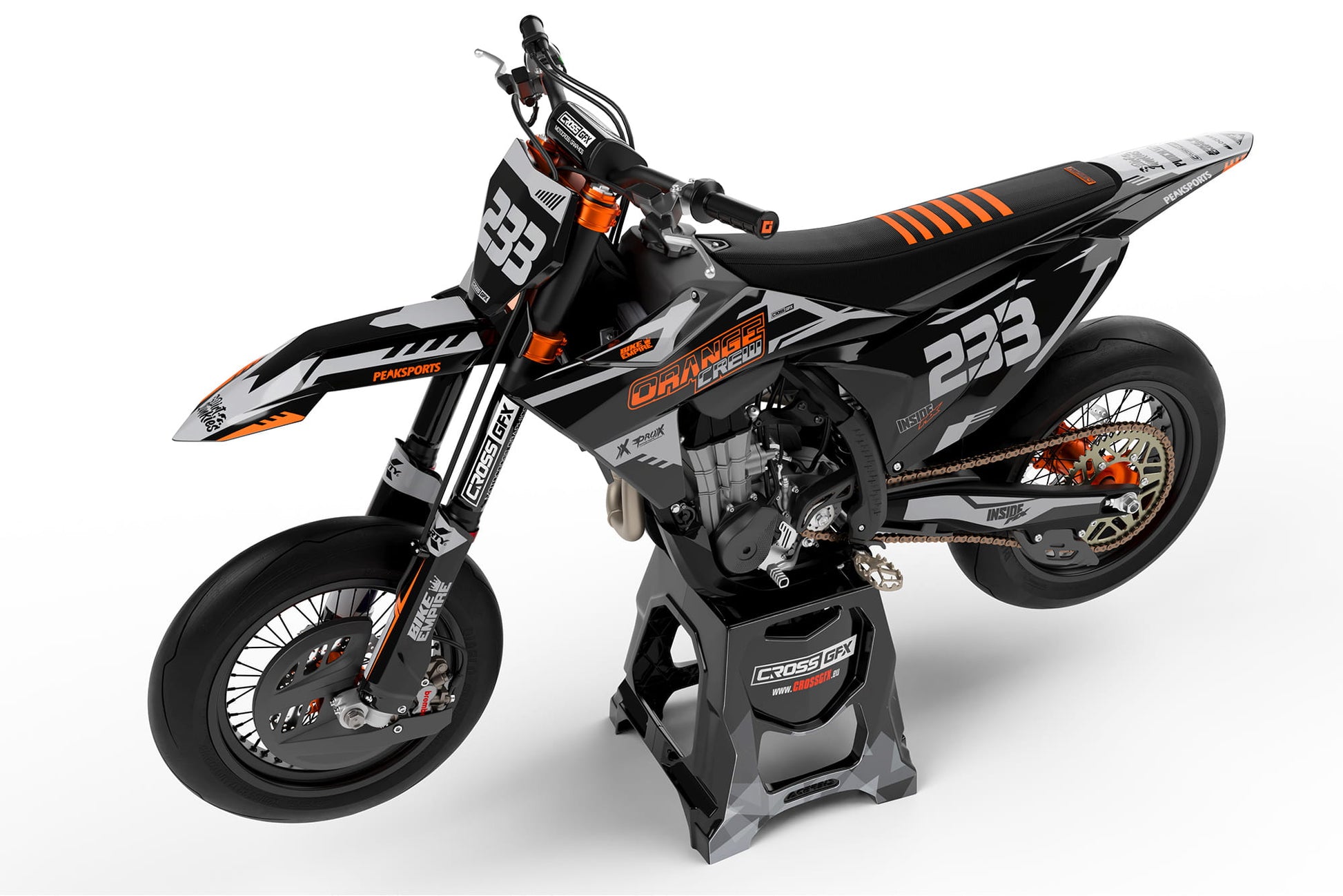 Side view of the Volt Grey racing graphics kit on a KTM dirt bike.