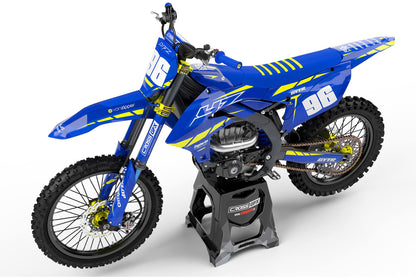 Left side view of the Proline Blue racing graphics kit on a Yamaha dirt bike.