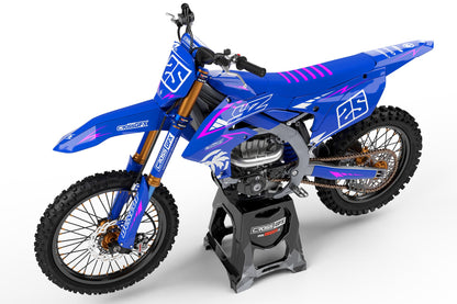 Left side view of the Stroke Pink racing graphics kit on a Yamaha dirt bike.