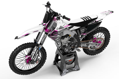 Side view of the Viper White racing graphics kit on a Suzuki dirt bike.