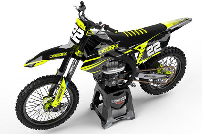 Side view of the Apex Fluorescent racing graphics kit on a Yamaha dirt bike.