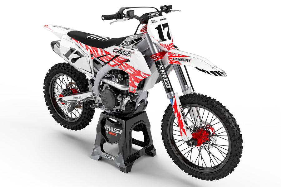 Front view of the Element Red motocross graphics kit on a Yamaha dirt bike.
