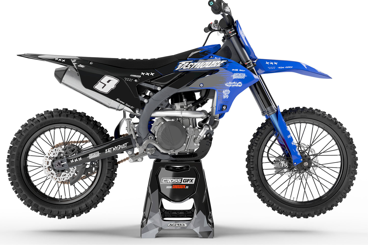 Side view of the Savage Blue racing graphics kit on a Yamaha dirt bike.