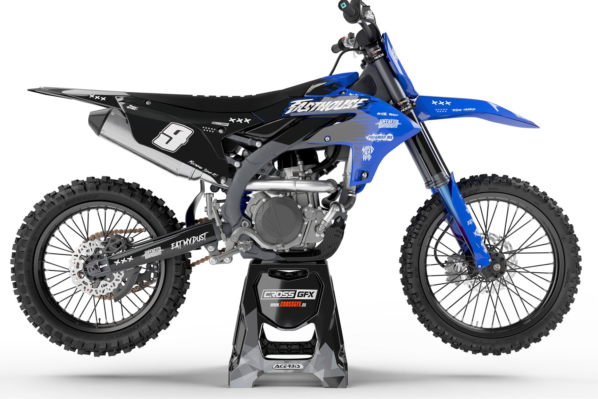 Side view of the Savage Blue racing graphics kit on a Yamaha dirt bike.