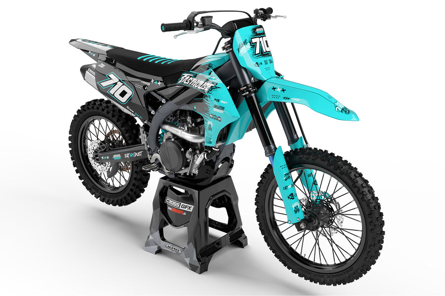 Front view of the Savage Teal motocross graphics kit on a Yamaha dirt bike.